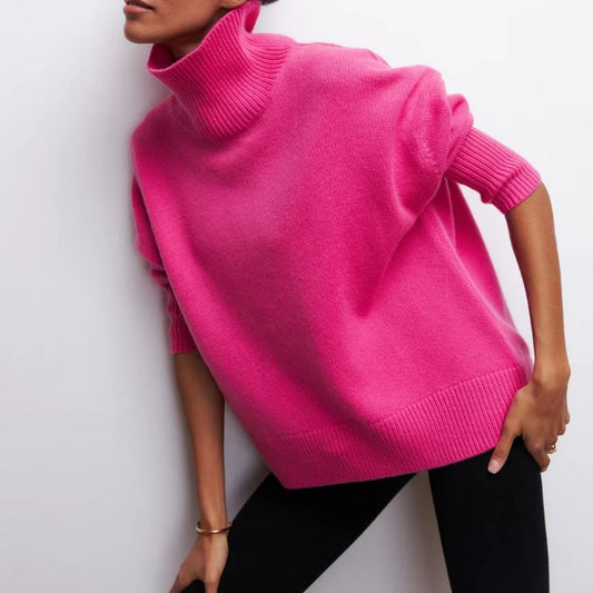 Women's cozy oversized turtleneck pullover in a soft knit, perfect for fall and winter comfort.