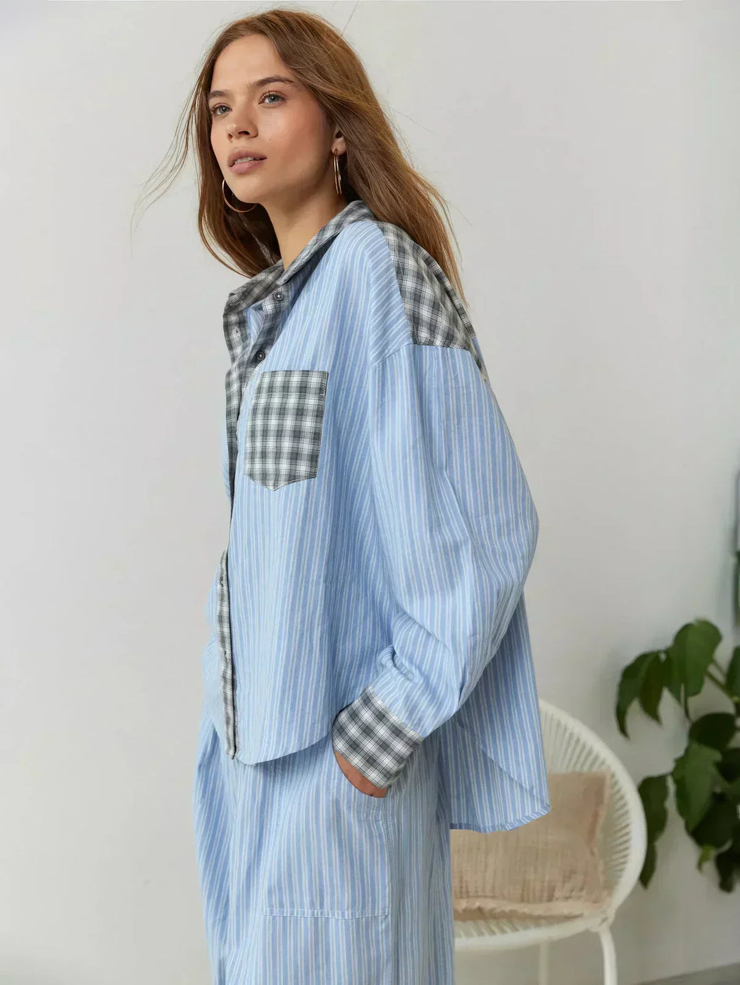Cozy women's plaid button-front pajama set. Ideal two-piece sleepwear for ultimate comfort and relaxed home fashion.
