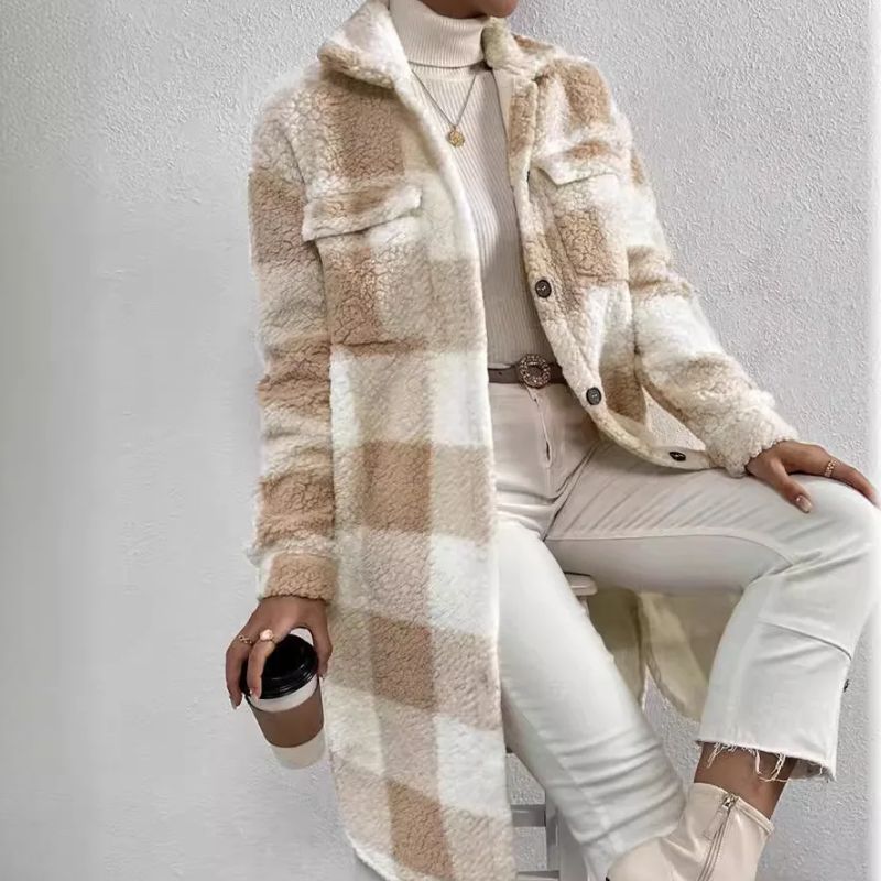 Fashionable women's blue plaid jacket, offering warm & cozy outerwear for autumn layering.