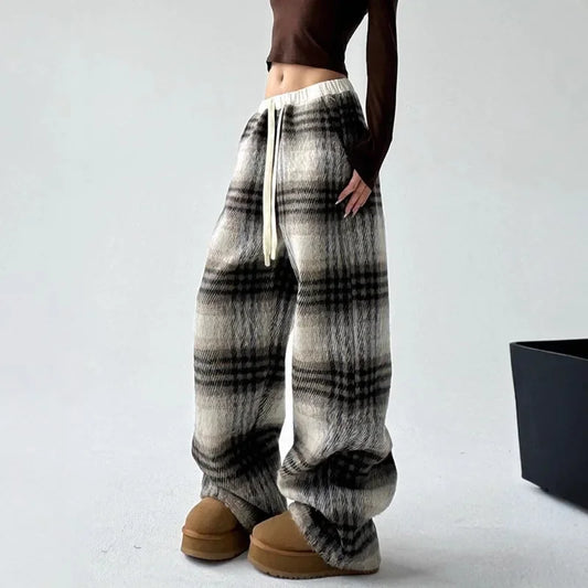 Women's cozy plaid wide-leg trousers, perfect for relaxed comfort & loungewear.