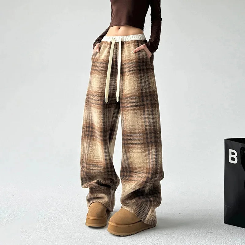 Oversized plaid wide-leg women's trousers, offering ultimate comfort & relaxed fit for loungewear.