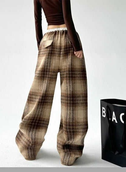 Cozy plaid wide-leg pants for women, essential winter fashion for ultimate comfort and relaxation.