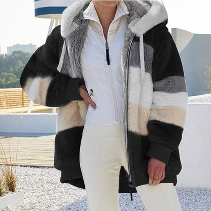 Plush hooded jacket for women. Soft, warm outerwear, perfect for casual winter fashion.
