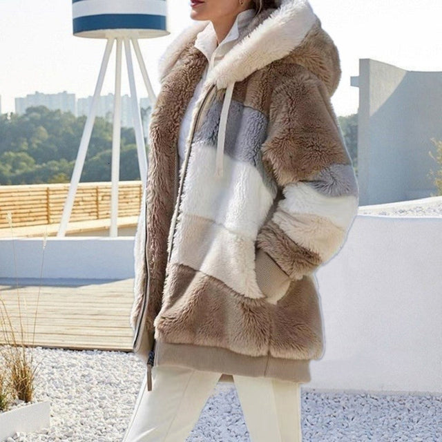 Hooded plush jacket for women. Enjoy warmth, comfort, and style in this cozy winter outerwear.