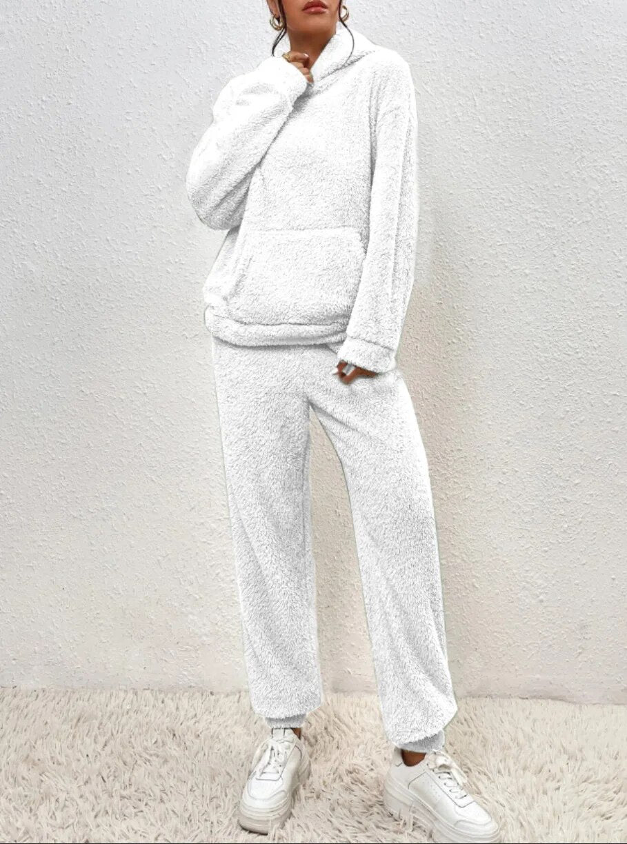 Cozy plush women's loungewear set. Soft, comfortable, hooded, and matching, ideal for home comfort.