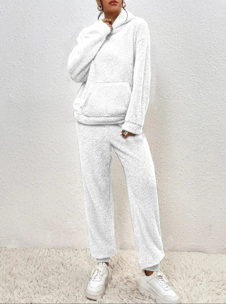 Cozy plush women's loungewear set. Soft, comfortable, hooded, and matching, ideal for home comfort.