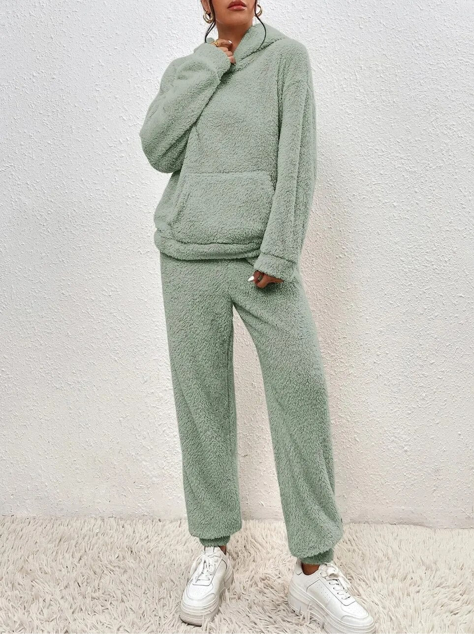 Relaxed fit women's plush loungewear set, soft touch material for ultimate comfort at home.
