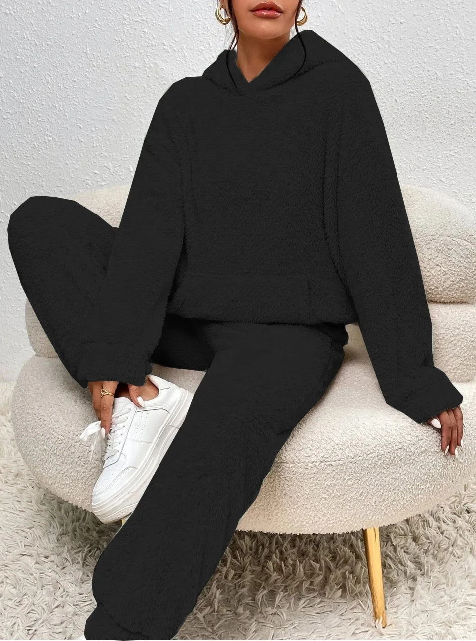 Two-piece women's hooded cozy plush set, matching top & bottom for ultimate comfort & home wear.