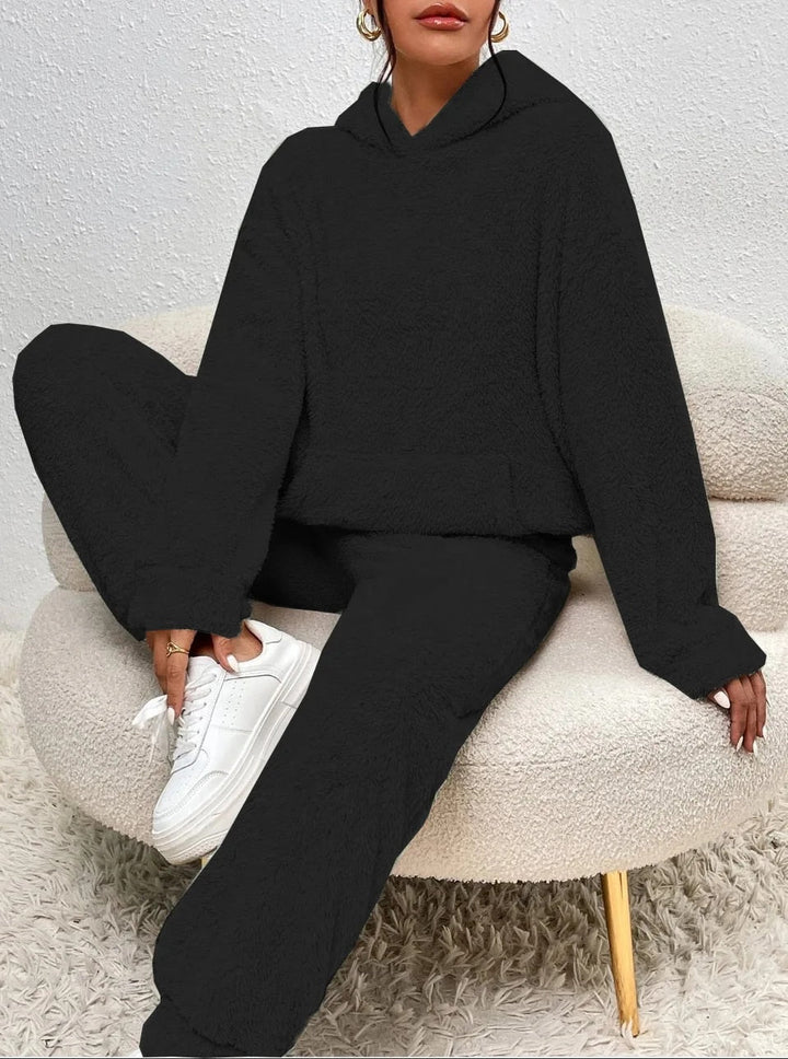 Two-piece women's hooded cozy plush set, matching top & bottom for ultimate comfort & home wear.