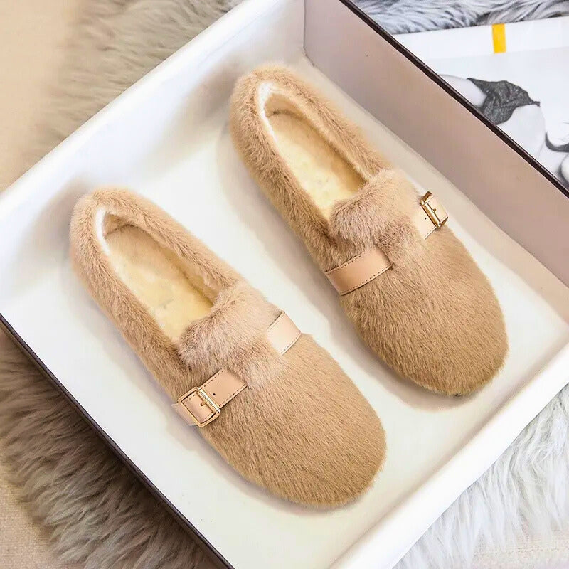 Women's cozy plush slip-on flat shoes, perfect for comfortable everyday wear. Warm winter casual footwear.