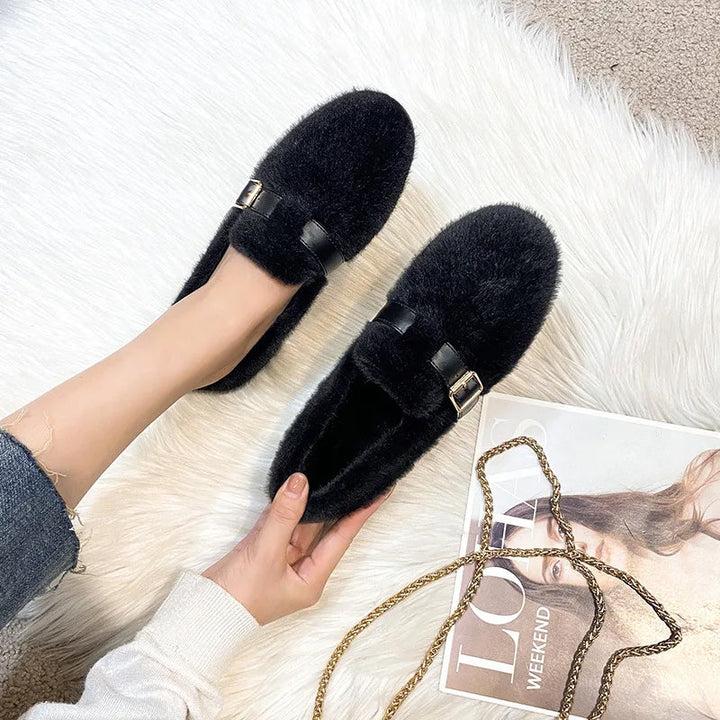 Soft plush women's slip-on flat shoes, offering ultimate comfort for everyday and casual wear. Warm footwear.