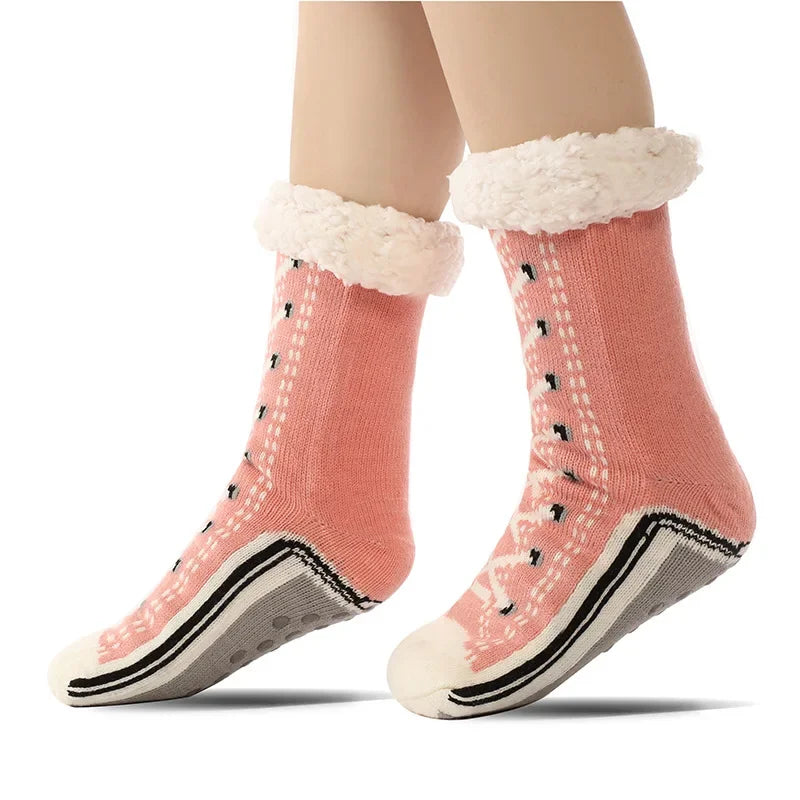 Soft, plush women's cozy sneaker socks featuring anti-slip grip. Ideal for comfortable and secure everyday wear.