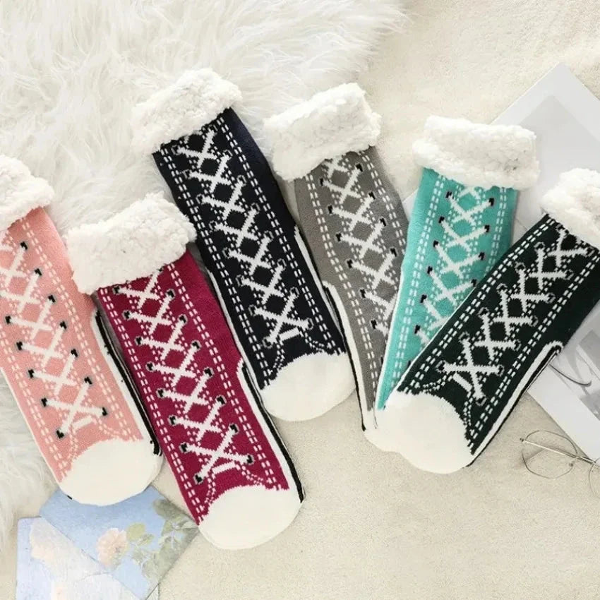 Luxurious plush women's cozy sneaker socks with anti-slip design for ultimate comfort & a secure fit.