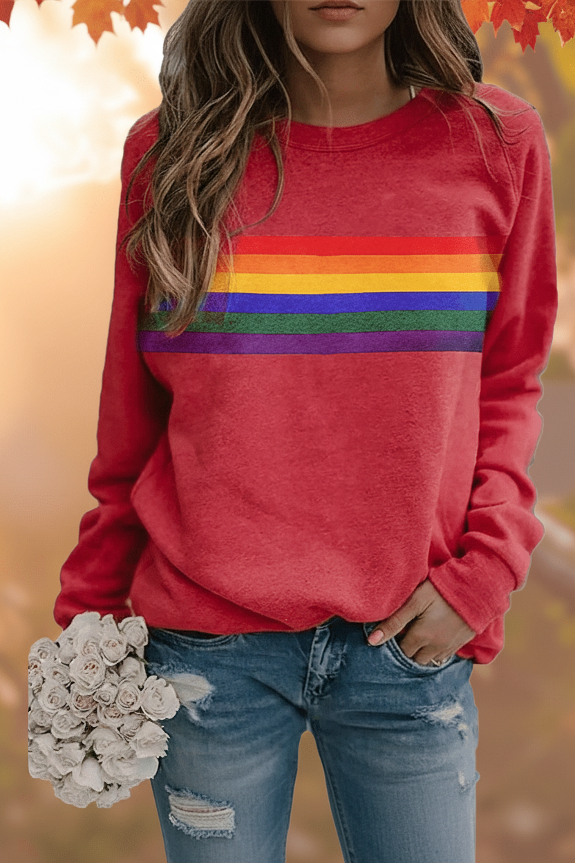 Women's cozy rainbow striped pullover sweatshirt. Soft, comfortable, and perfect for casual everyday wear.