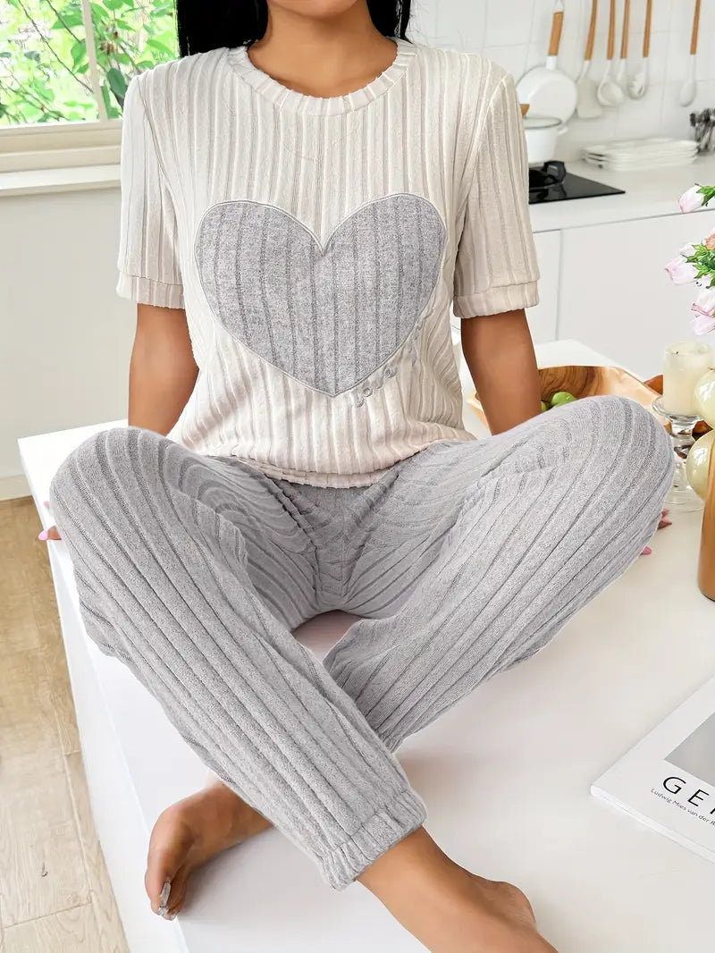 Comfortable women's pajamas set, ribbed fabric & adorable heart design. Soft for sleep or relaxing.