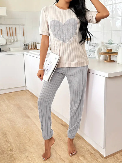 Trendy women's ribbed loungewear set, featuring a cute heart print. Soft and comfortable for all-day wear.