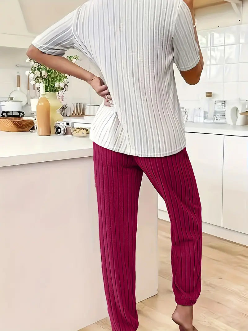 Delightful women's heart motif ribbed loungewear set. Enjoy cozy comfort and a stylish casual look.