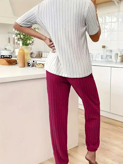 Delightful women's heart motif ribbed loungewear set. Enjoy cozy comfort and a stylish casual look.