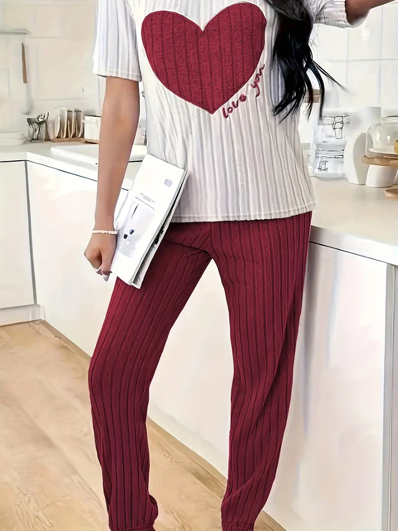 Stylish women's ribbed set with charming heart motif. Perfect casual wear or soft pajamas for women.