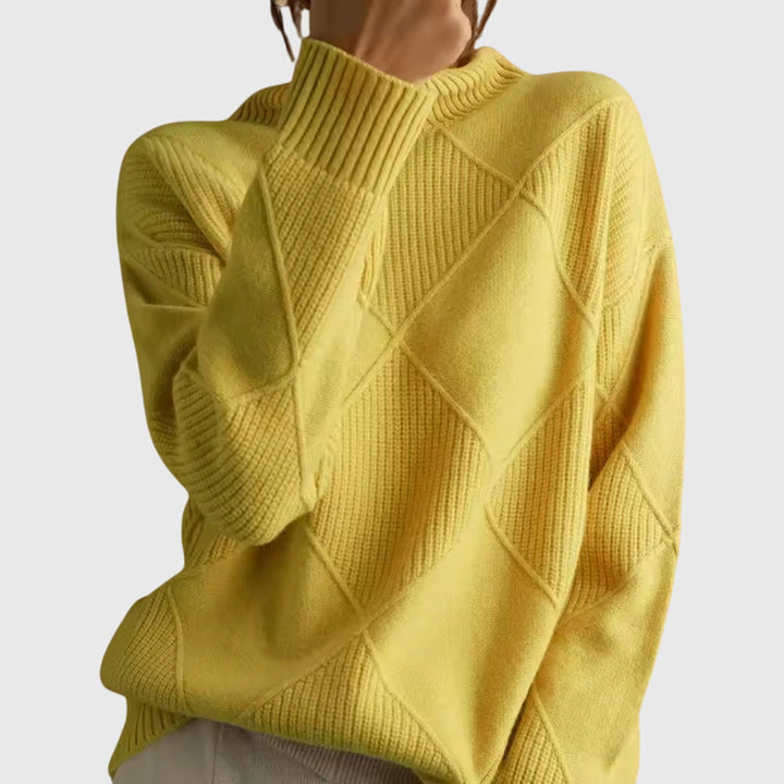 Cozy women's turtleneck sweater, a must-have for winter, combining comfort with elegant design.