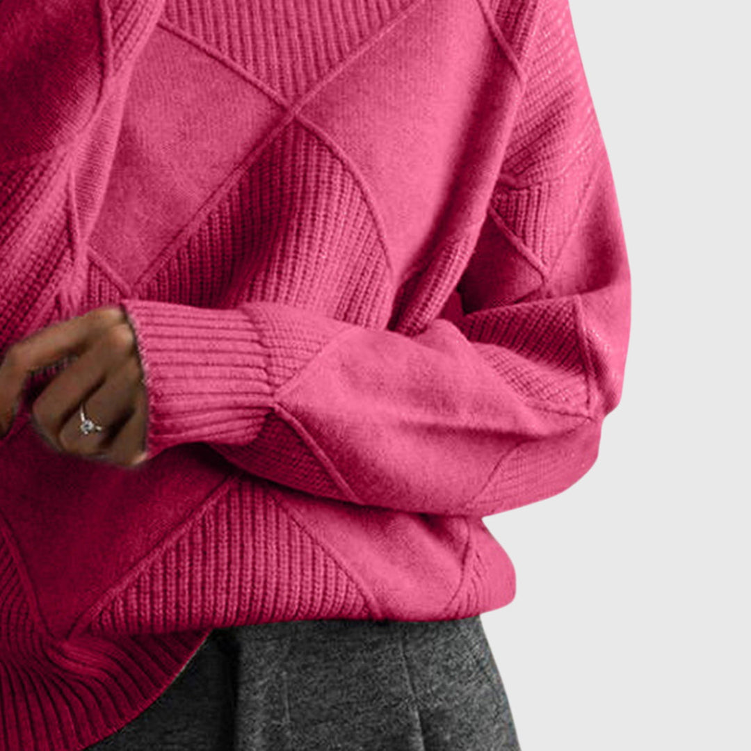 Elegant women's turtleneck jumper in a relaxed fit, offering warmth and comfort for cold days.