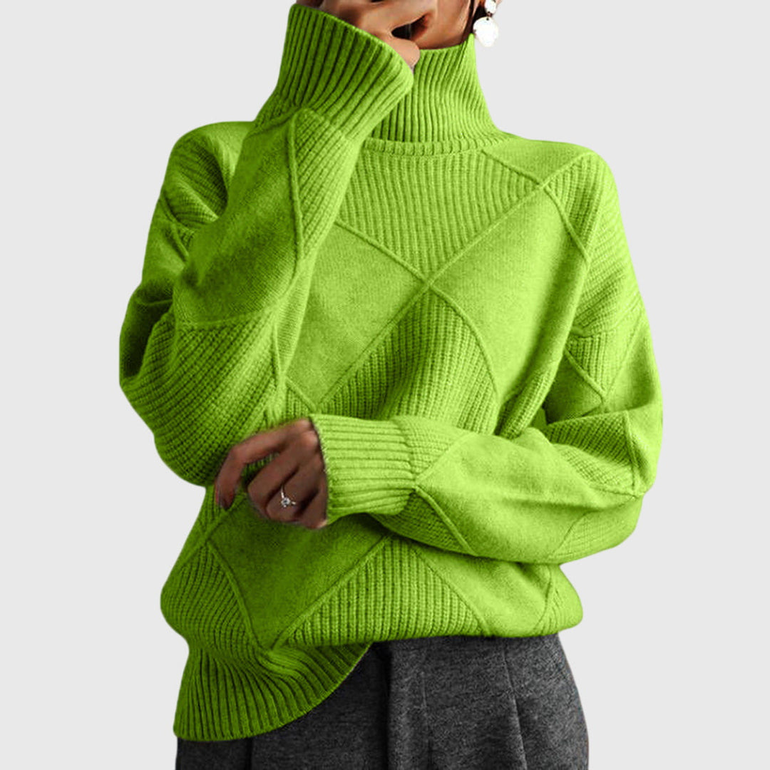 Back view of the women's oversized jumper, highlighting the elegant diagonal seam design.
