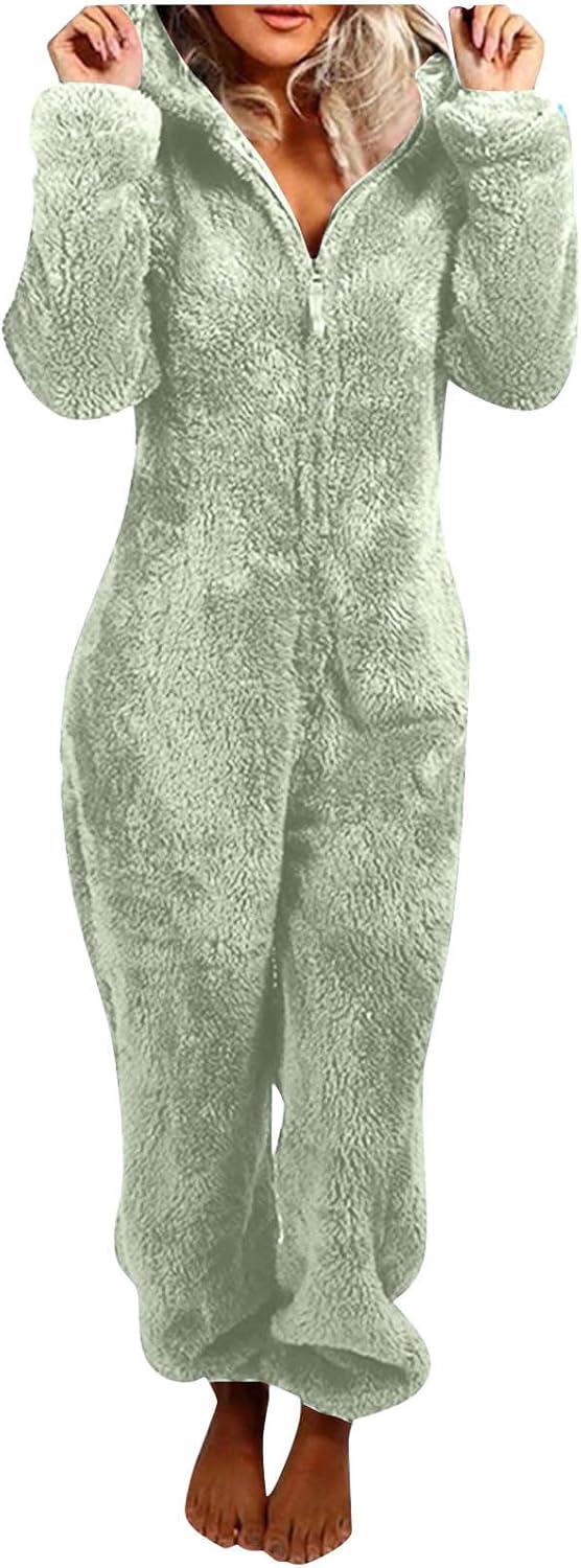 Fuzzy hooded onesie pajamas for women, sherpa material, cozy and comfortable adult loungewear.