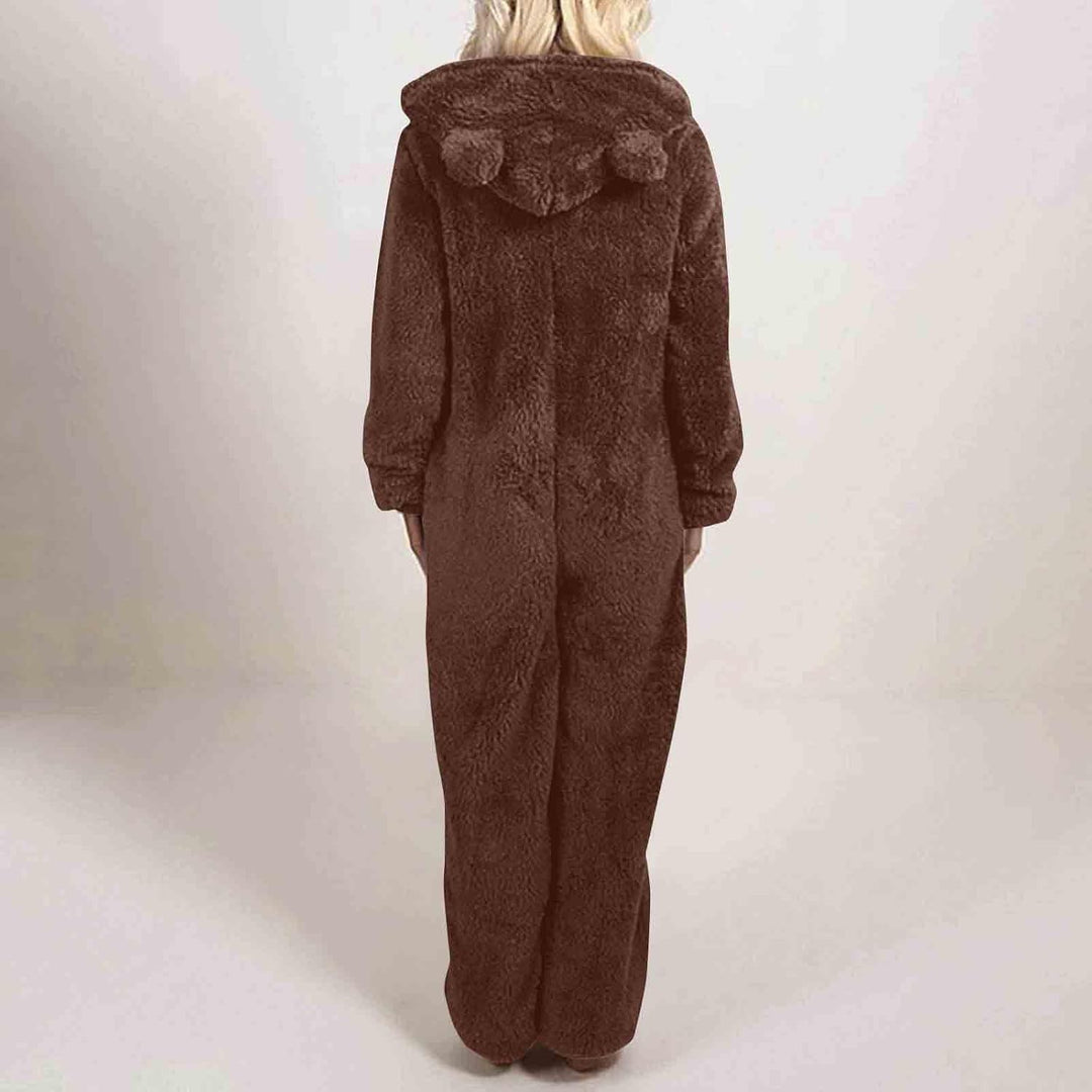 Fuzzy sherpa hooded onesie for women, cozy loungewear, plush pajamas for maximum comfort.