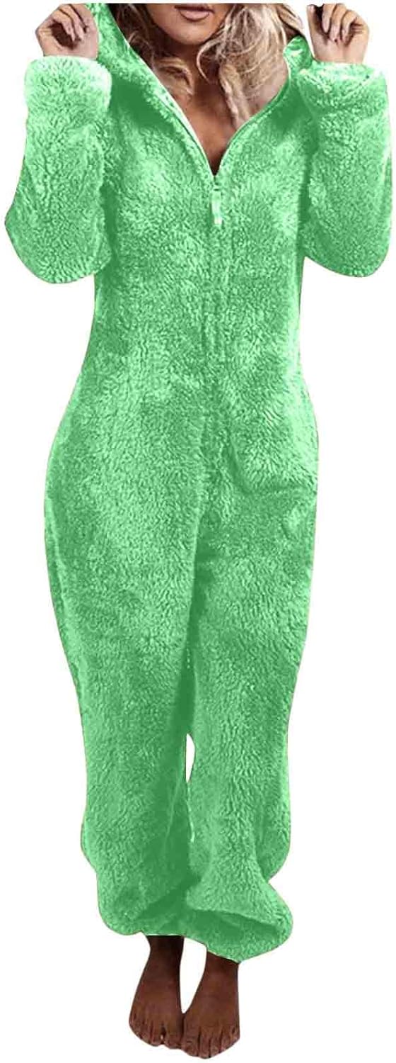 Soft sherpa fuzzy women's onesie with hood, warm adult sleepwear, perfect for chilly nights.