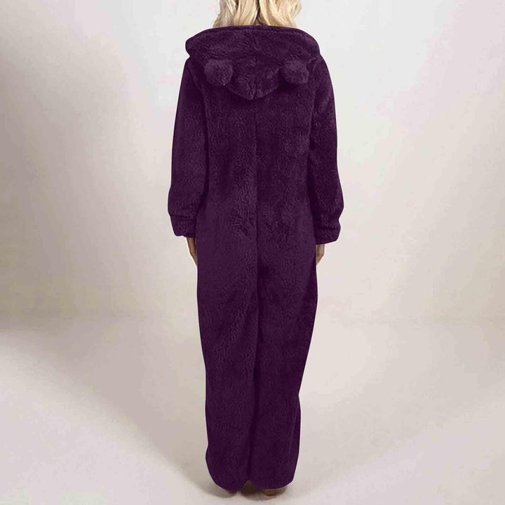 Plush hooded women's sherpa onesie, fuzzy pajamas for ultimate comfort and warmth this winter.