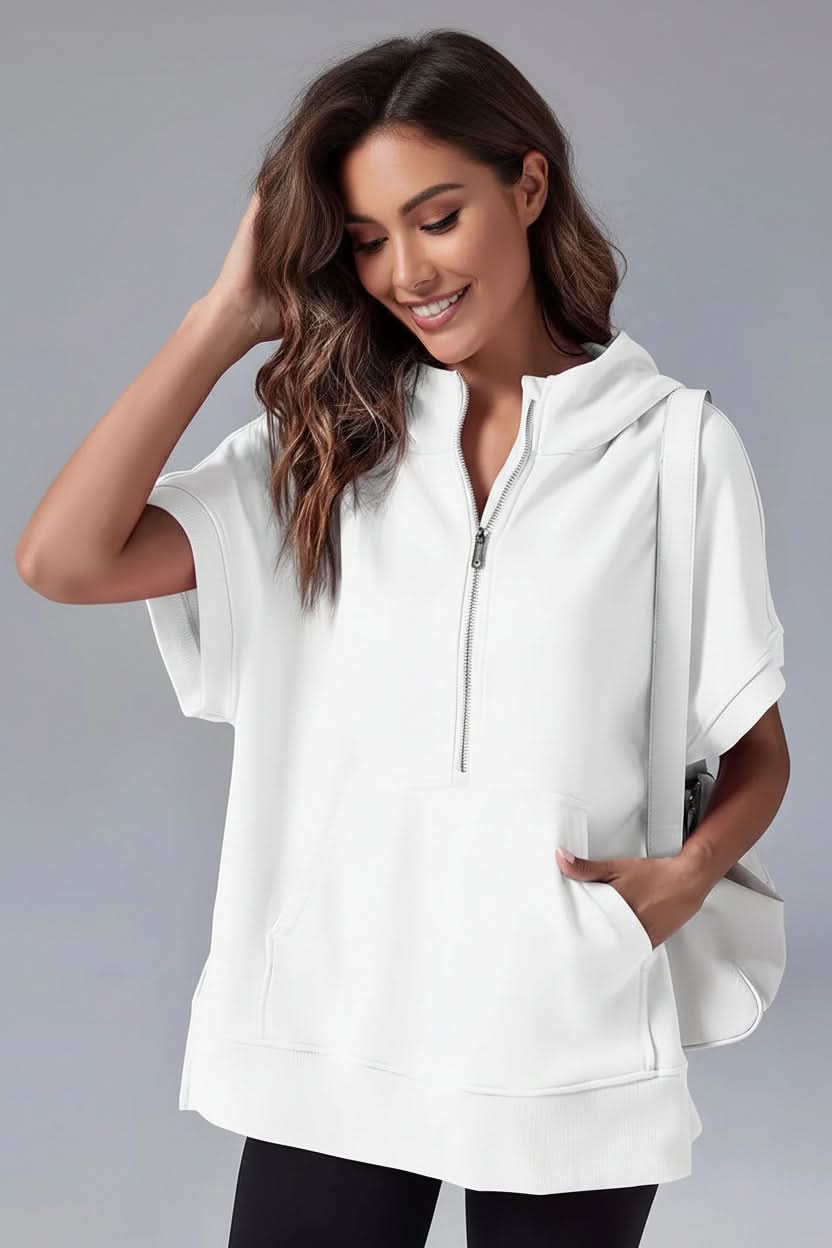Soft women's short sleeve half-zip hoodie, a relaxed fit hooded top for cozy casual wear.