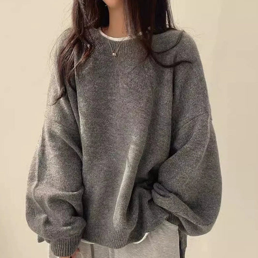 Women's cozy split hem sweater in a relaxed fit. Soft knit pullover for comfortable everyday fall and winter wear.