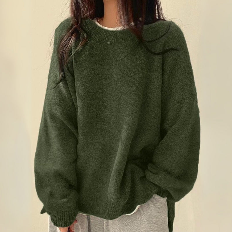 Soft, warm women's cozy knitwear sweater with a modern split hem design for effortless everyday comfort.