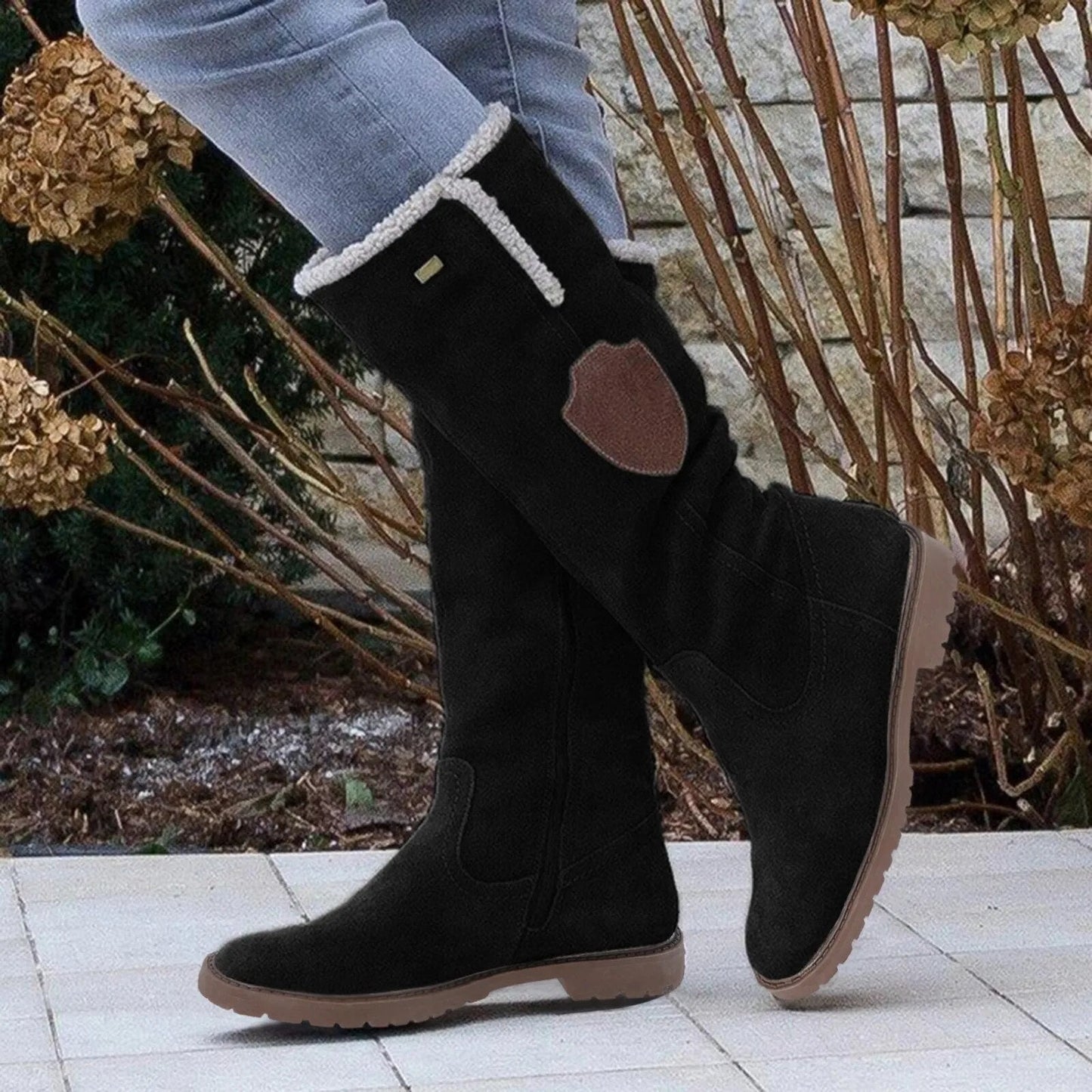 Stylish women's brown winter boots with slip-resistant sole. Comfortable and warm for cold weather everyday wear.