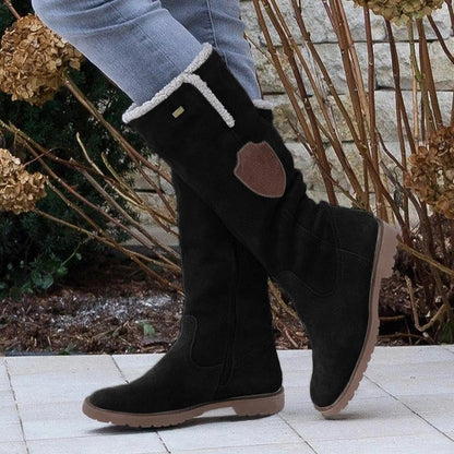 Stylish women's brown winter boots with slip-resistant sole. Comfortable and warm for cold weather everyday wear.