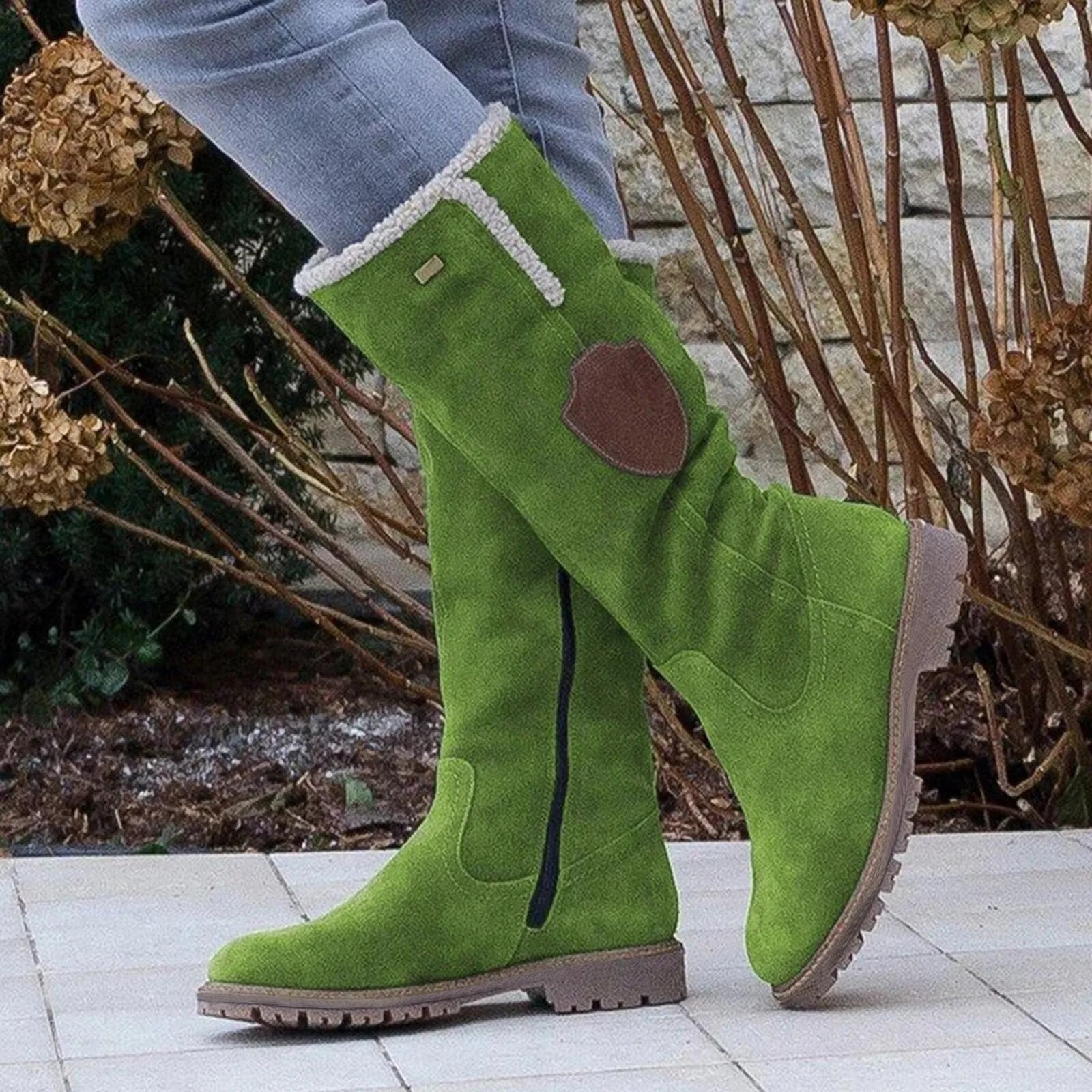 Cozy black women's winter boots. Fashionable and comfortable cold weather footwear for ultimate warmth.