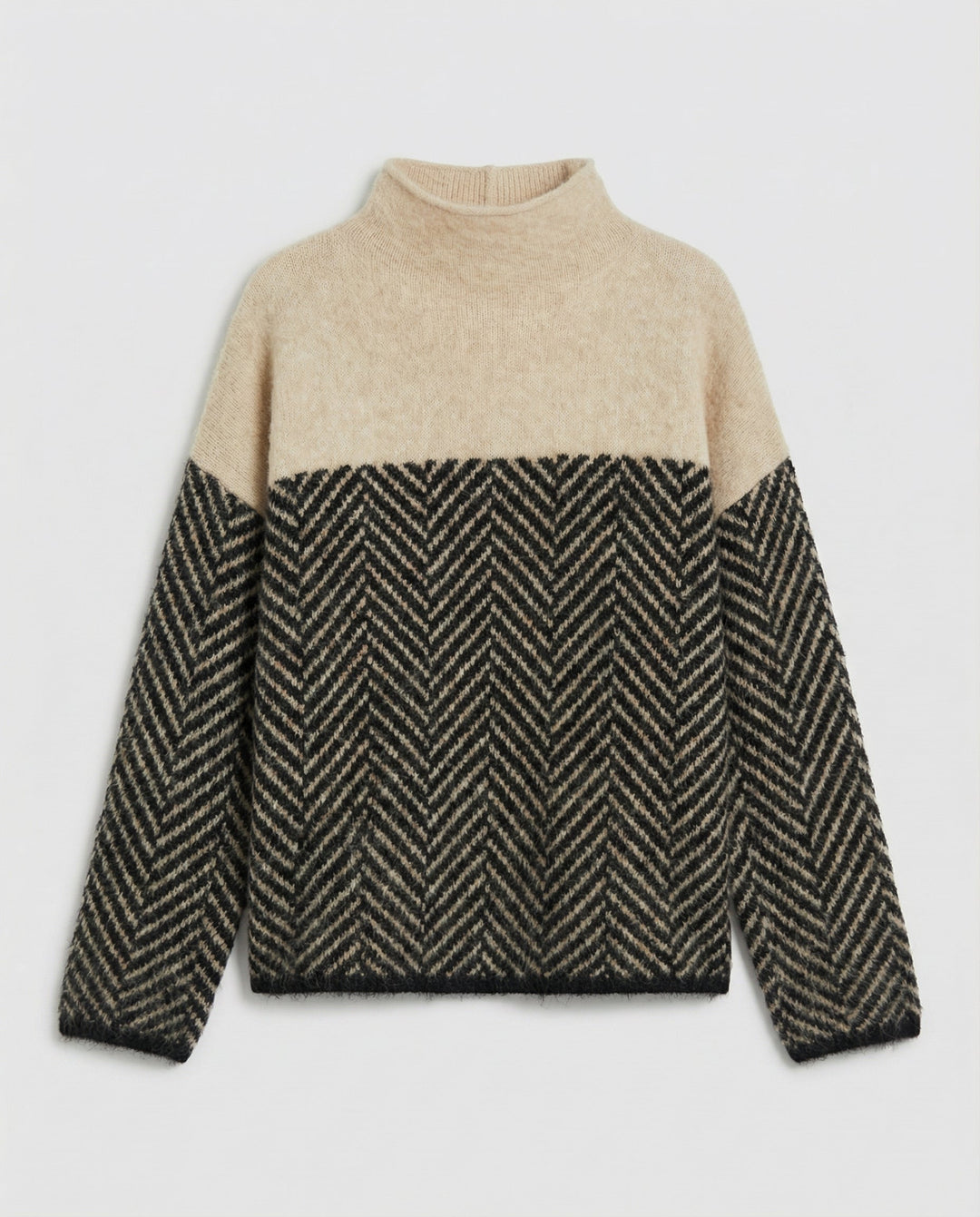 Soft knit women's long sleeve turtleneck sweater, providing cozy warmth and elegant style for any occasion.