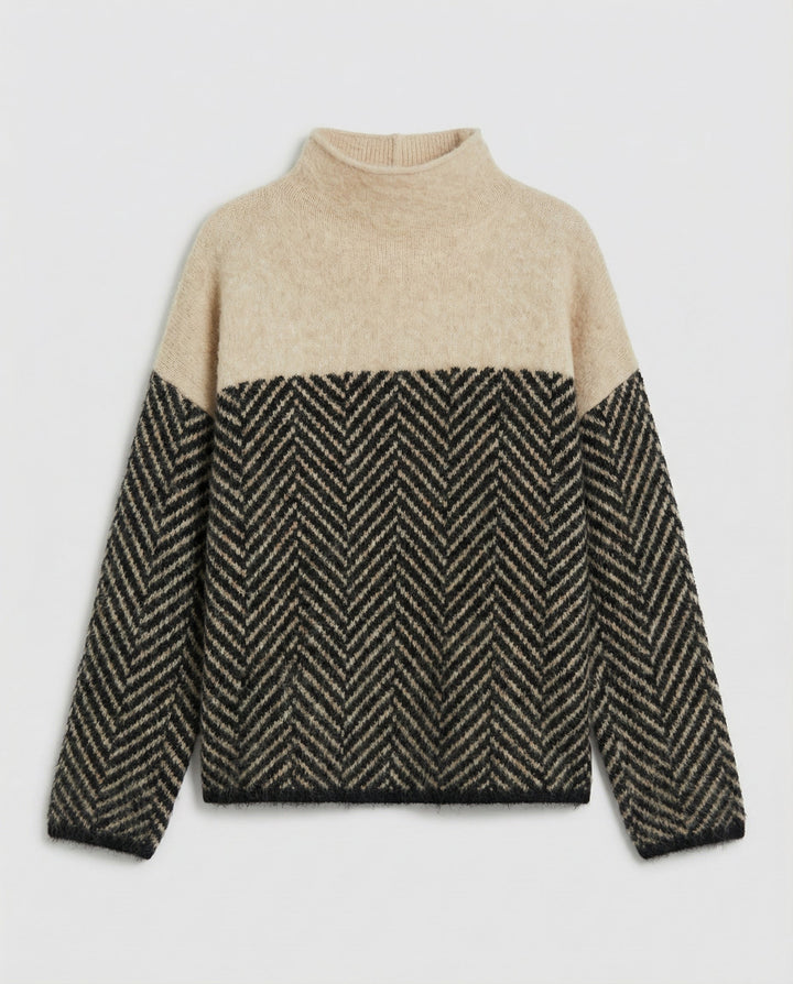Soft knit women's long sleeve turtleneck sweater, providing cozy warmth and elegant style for any occasion.