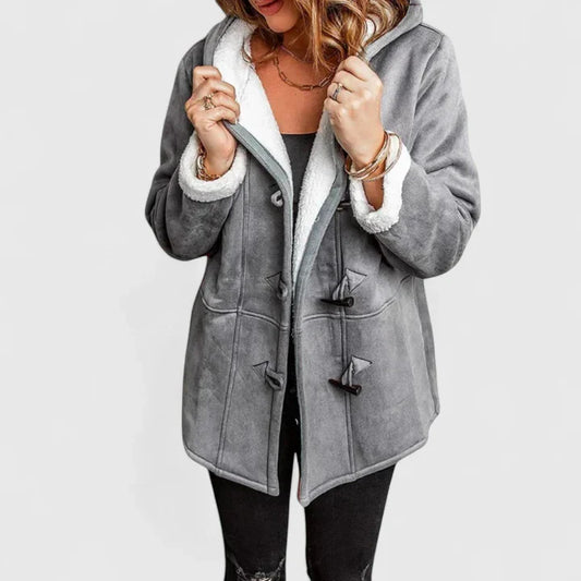 Women's cozy toggle winter coat, perfect for cold weather. Warm, hooded outerwear for fall & winter fashion.