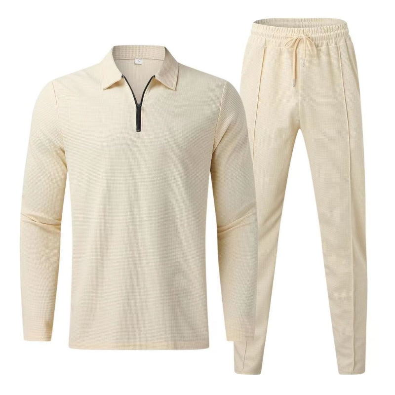 Comfortable women's two-piece waffle knit set with long sleeve zip top and matching joggers. Relaxed fit.
