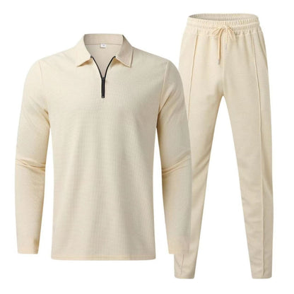 Comfortable women's two-piece waffle knit set with long sleeve zip top and matching joggers. Relaxed fit.