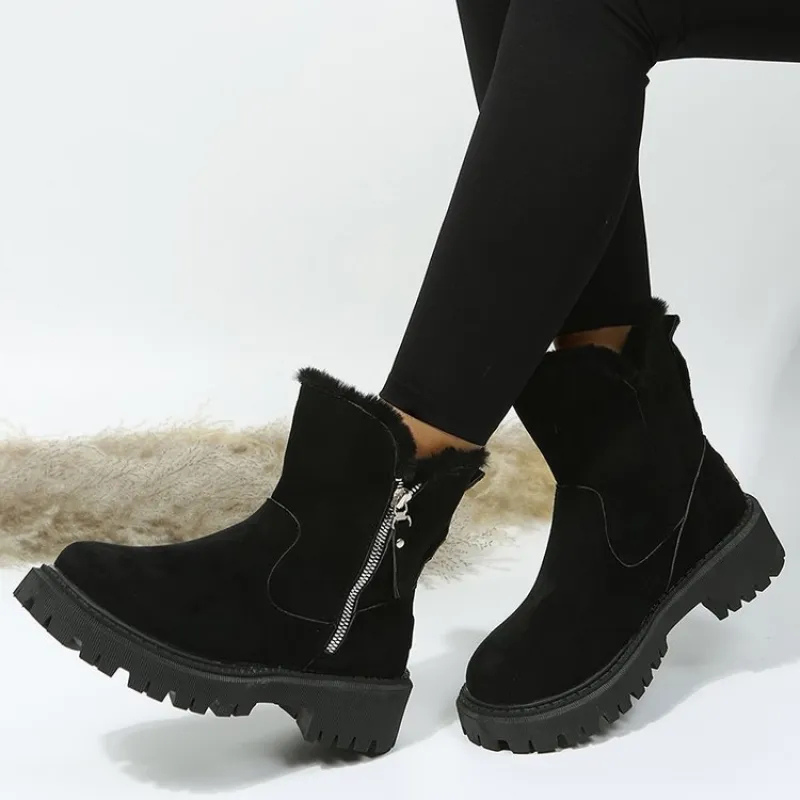 Chic women's winter boots. Stylish, warm, and comfortable ankle boots for snow & cold weather. Cozy footwear.