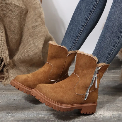 Warm women's snow boots with soft lining, ensuring ultimate comfort & coziness for cold winter days.