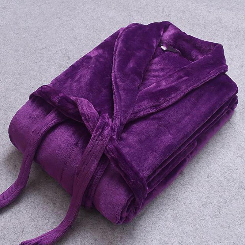 Plush women's spa bathrobe, cozy and absorbent, ideal for post-bath relaxation and comfort.