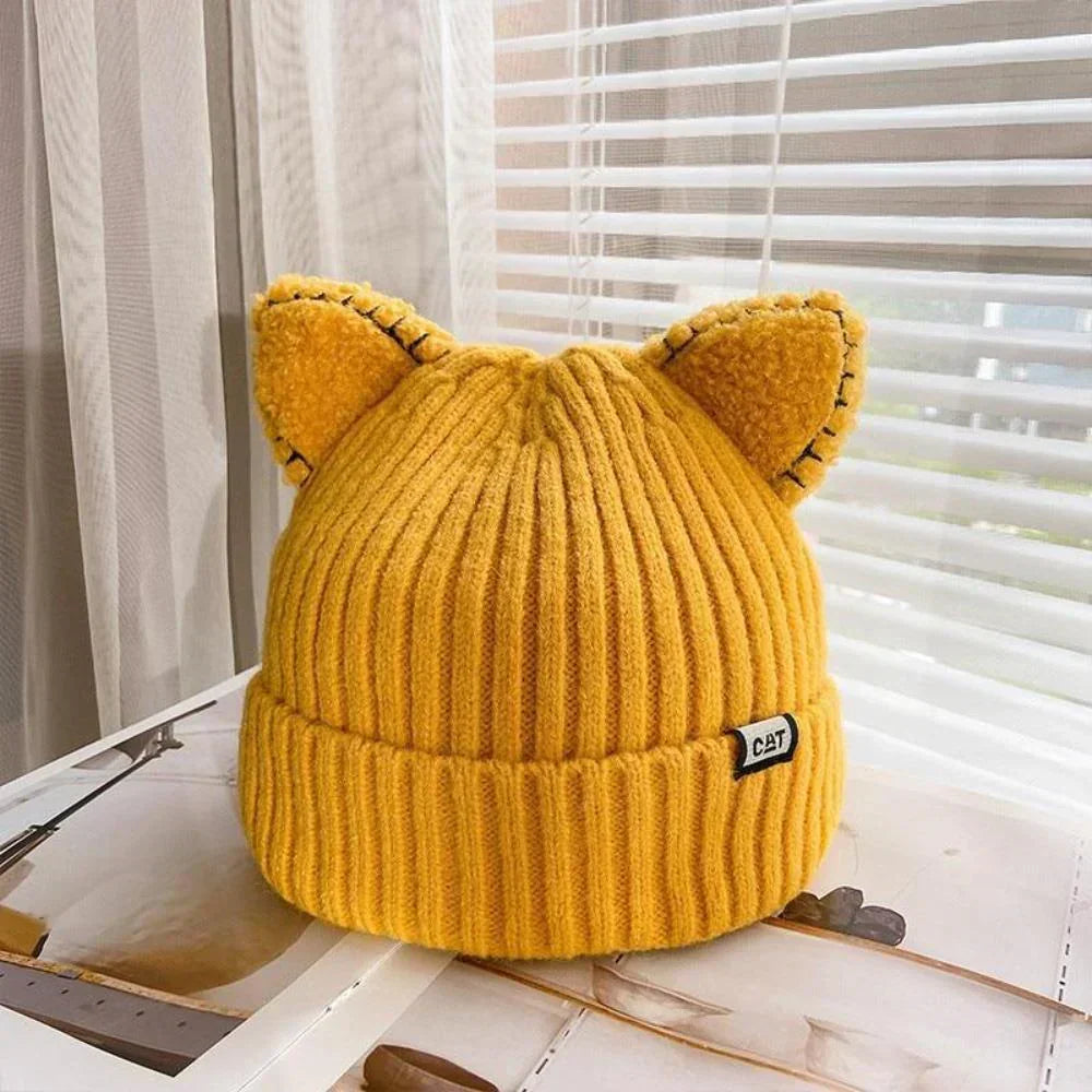 Warm women's cat ears beanie, a cozy winter hat for stylish cold weather protection & playful fashion.