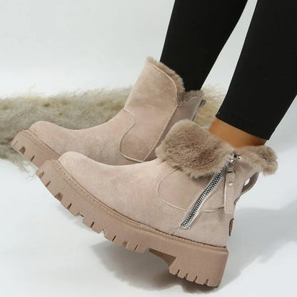 Close-up of the durable sole and side zipper on a pair of women's warm winter boots.