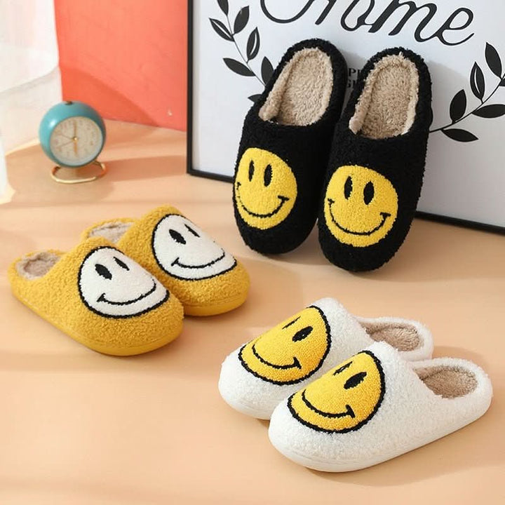Gift idea: Women's comfort slippers with a smiley face, thick sole, and soft, warm interior.