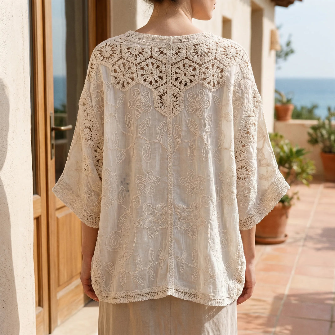 Women's cream bohemian open-front cardigan with three-quarter sleeves & textured knit. Perfect lightweight summer layer.