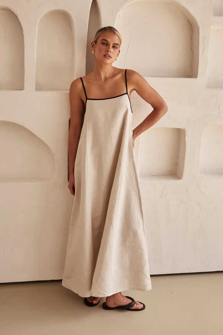 Comfortable oversized A-line cream maxi dress for women, perfect for casual summer resort wear. Square neck, spaghetti strap.