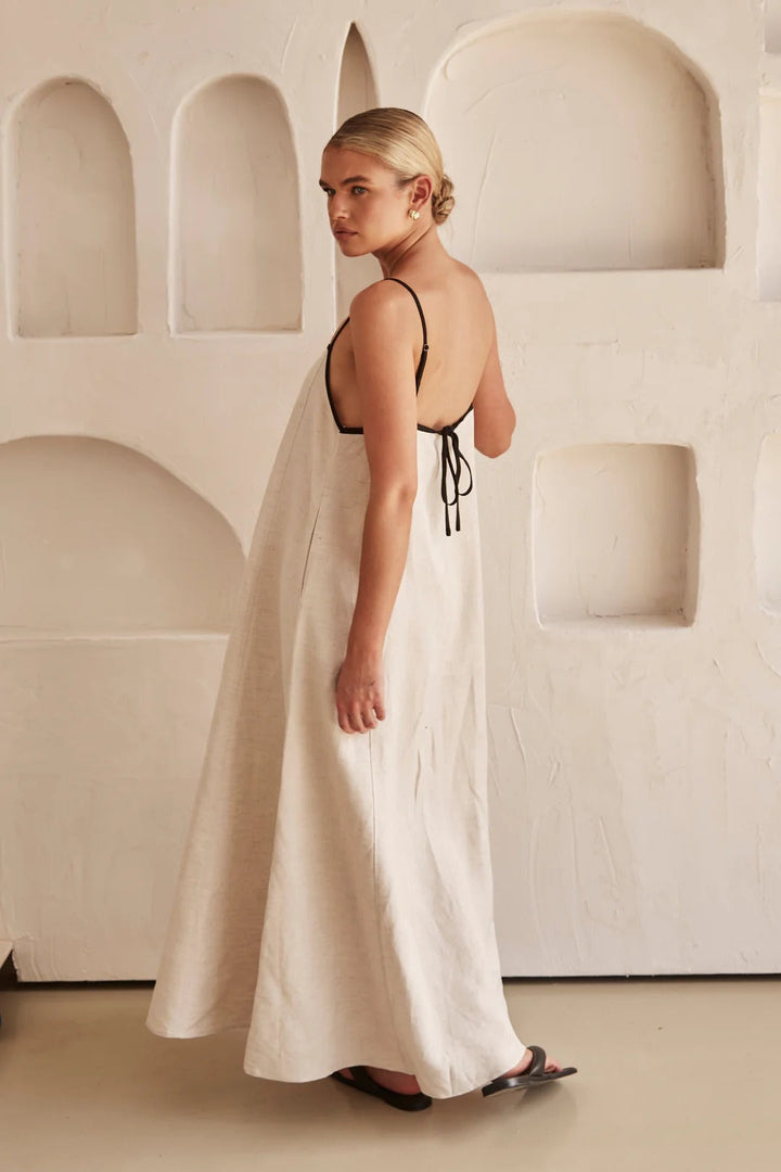 Flowy cream maxi dress for women, with a chic square neck & delicate spaghetti straps. Comfortable A-line summer style.